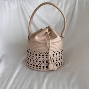 Alaia Laser-cut Corset Bucket Top-handle Bag In Galet