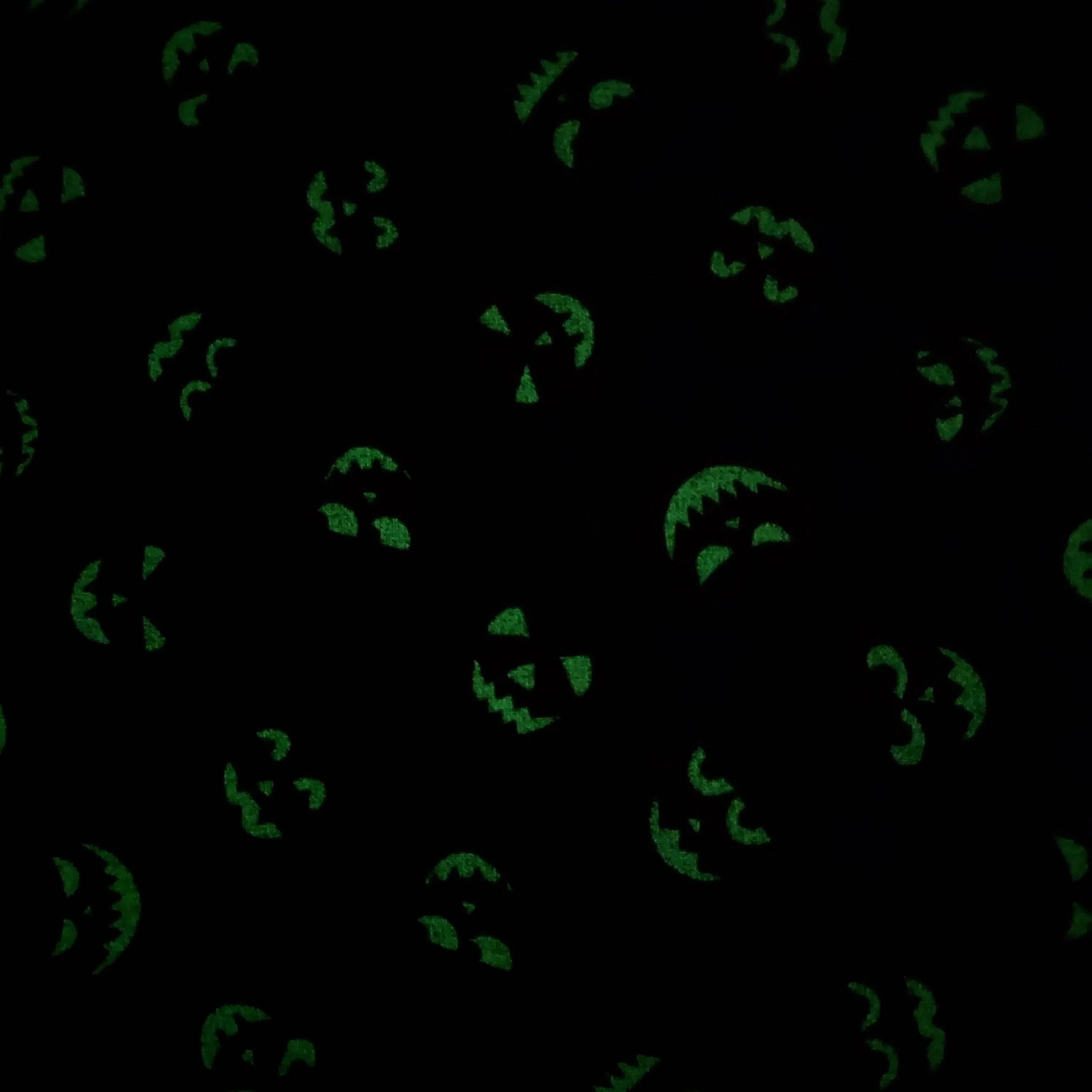 Lewis and Irene Haunted House Glow In The Dark Pumpkin Faces On Black Cotton Fabric