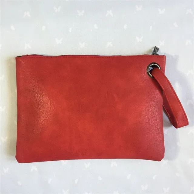Oversize envelope clutch wristlet handbag