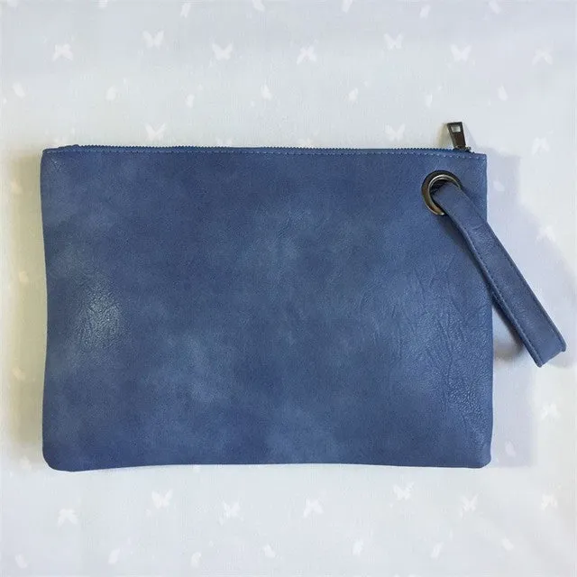 Oversize envelope clutch wristlet handbag