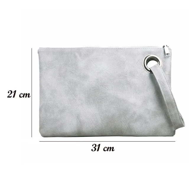 Oversize envelope clutch wristlet handbag