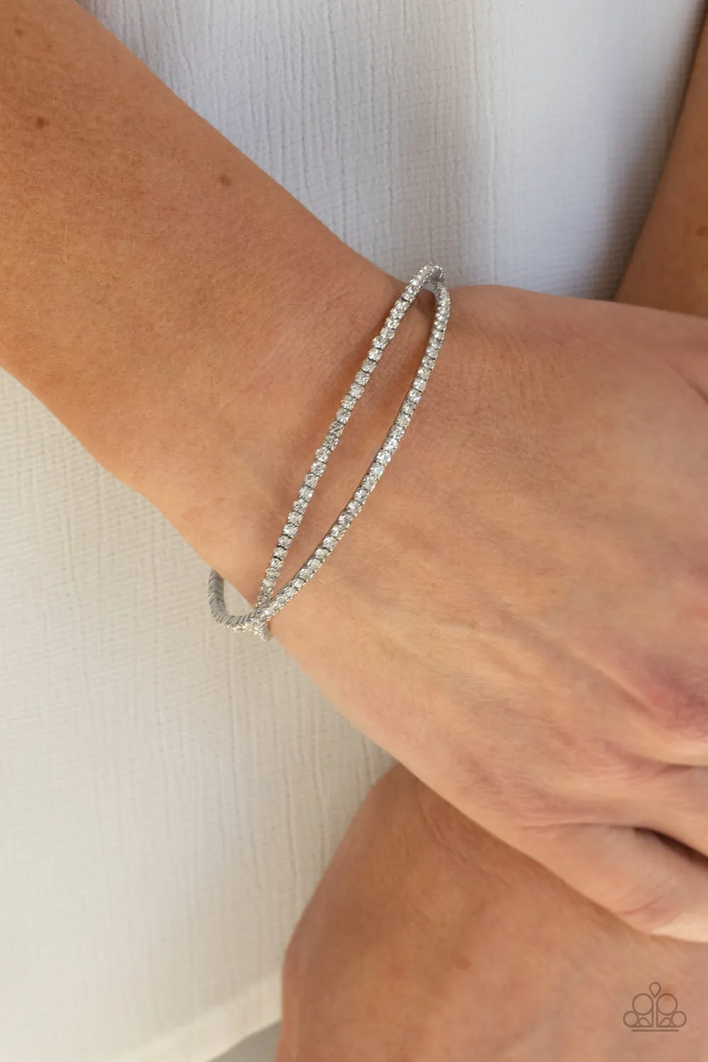 Plus One Status - White Bracelet - Paparazzi Accessories